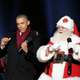 President Barack Obama dances with Santa Claus during the lighting of the National Christmas Tree on Dec. 4, 2014, in Washington, D.C.
Chris Kleponis-Pool/Getty Images